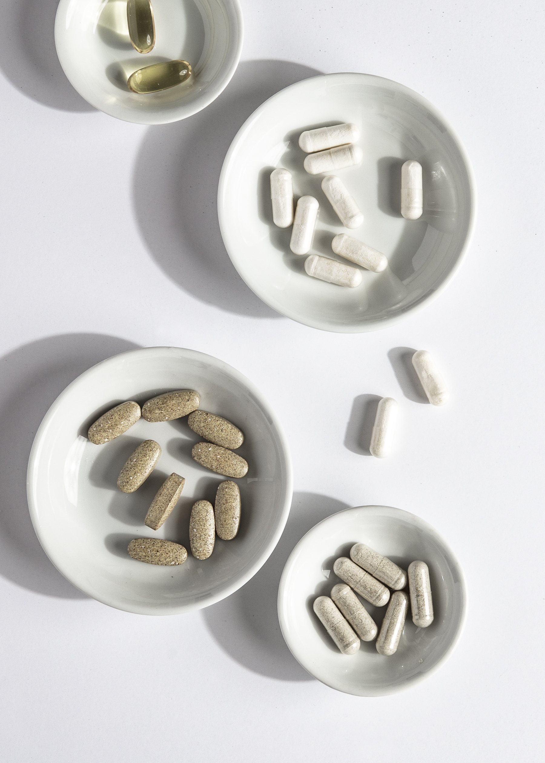 Vitamin supplements in bowls